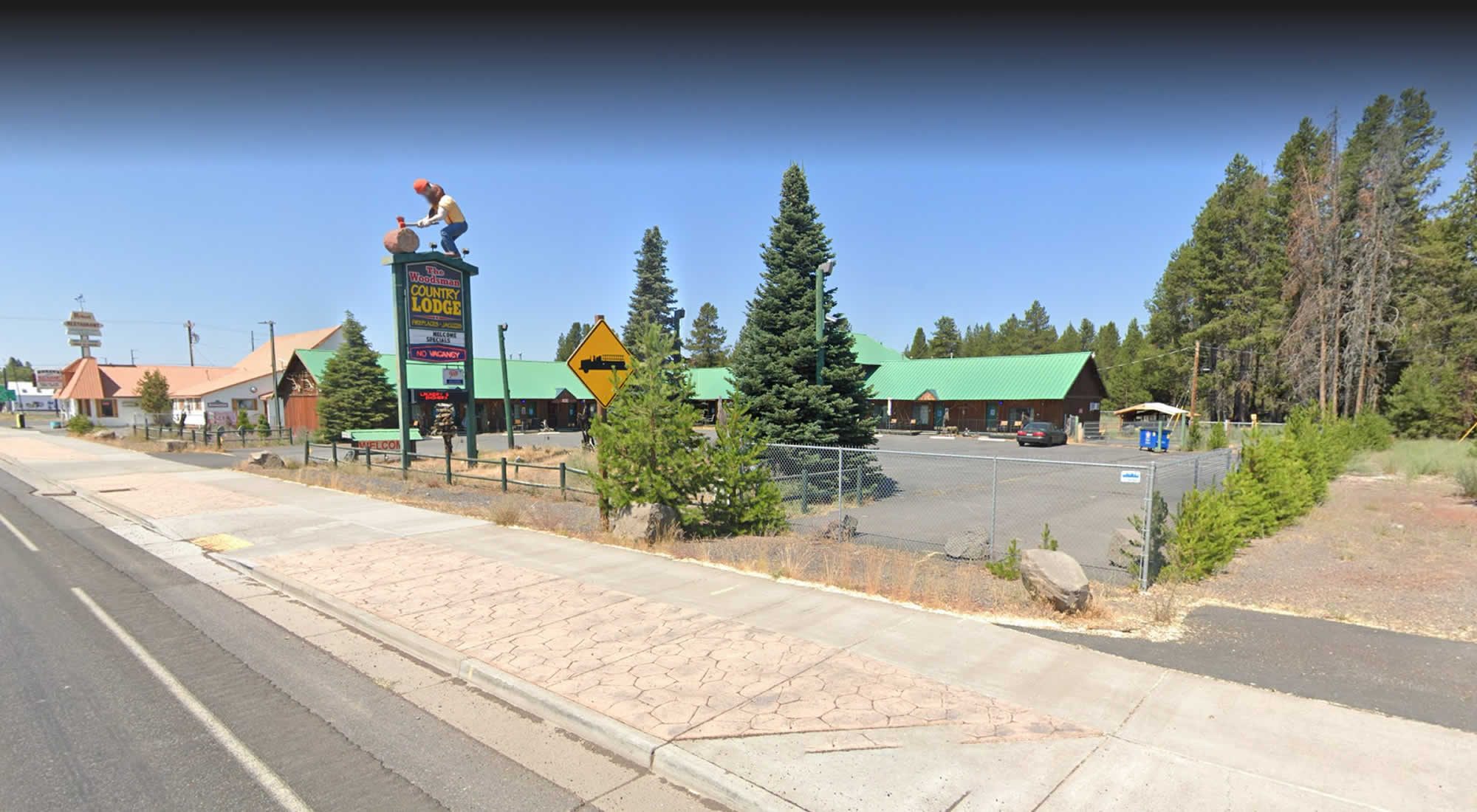 Contact The Woodsman Country Lodge & RV Park